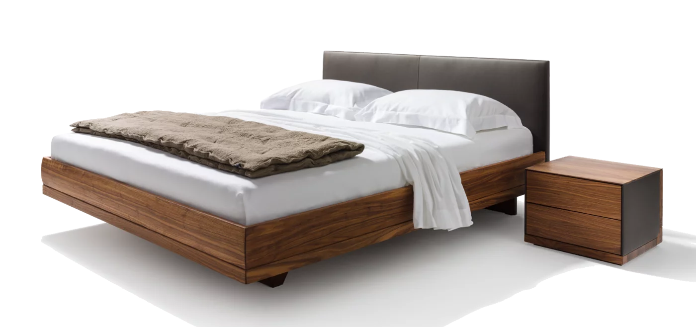 Naturholzbett mit Lederhaupt passend mit dem riletto Nachttisch riletto Bett in Nussbaum mit Lederhaupt zusammen mit dem riletto Nachtkästchen