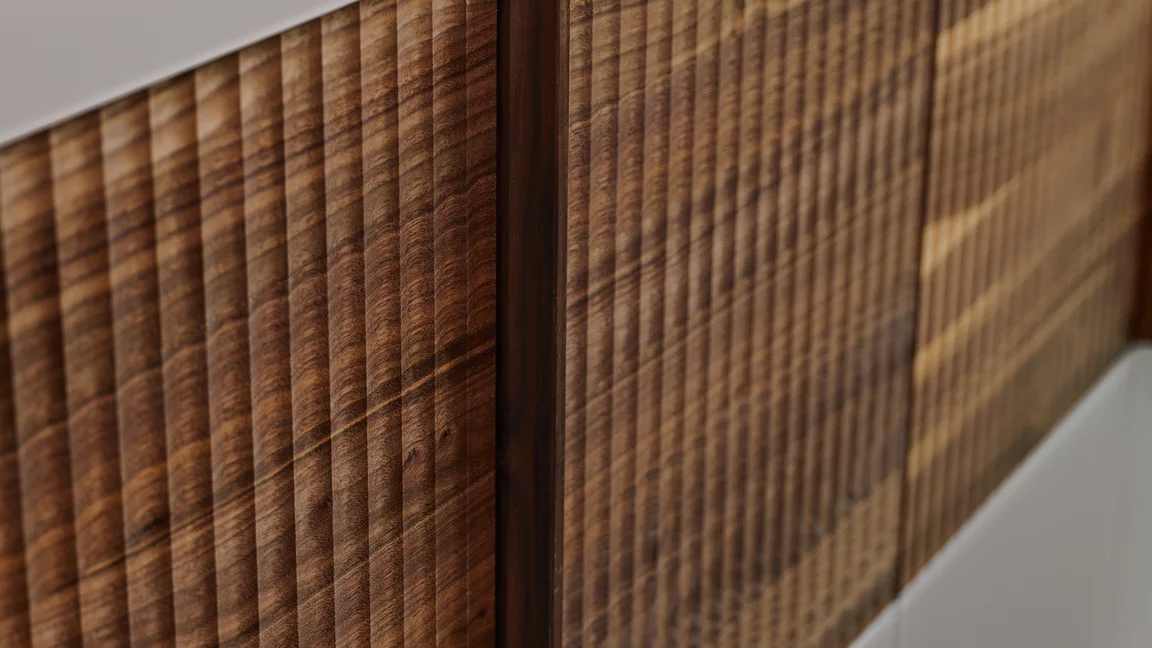 hinge door wardrobe wooden band relief made of wood with coloured glass fronts, detailed view valore hinge door wardrobe wooden band relief in walnut with coloured glass fronts, detailed view