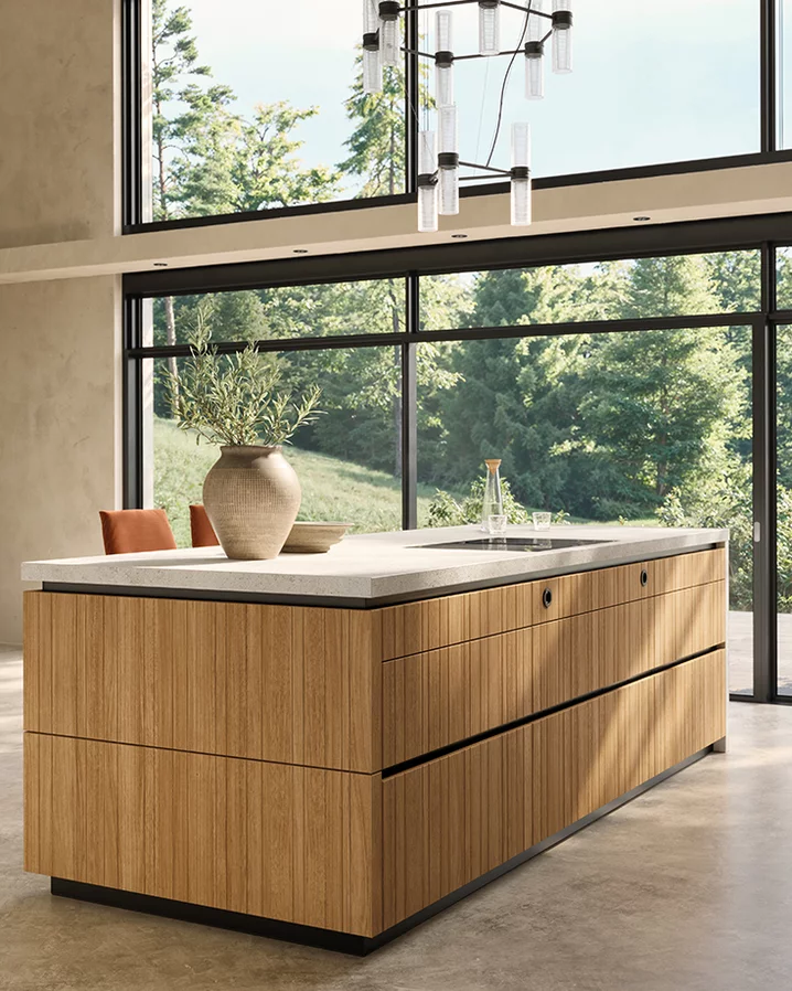 Kitchen island made of solid wood with vertical millings echt.zeit evo kitchen island in solid oak with all-round vertical millings
