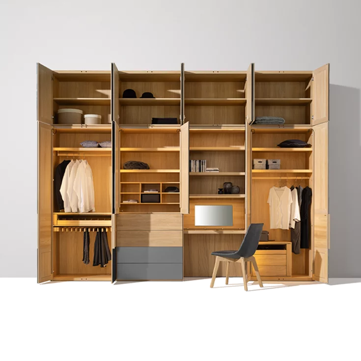 Hinged door wardrobe with solid wood interior to match the lui chair valore hinged door wardrobe illuminated with coloured glass fronts and interior in oak white oil to match the lui chair