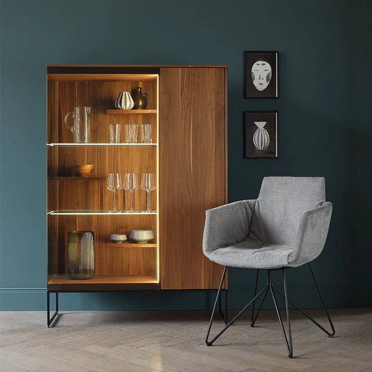 wooden cabinet in walnut with comfortable grand lui chair filigno wooden display cabinet in walnut with smoked glass door and metal frame in matt black and the comfortable grand lui chair
