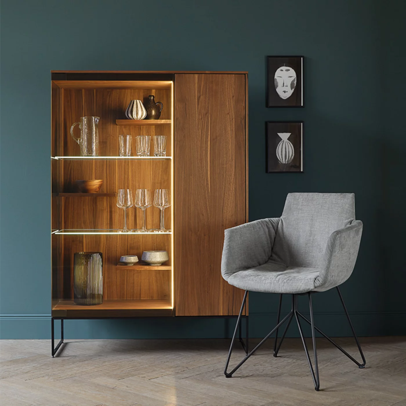 wooden cabinet in walnut with comfortable grand lui chair filigno wooden display cabinet in walnut with smoked glass door and metal frame in matt black and the comfortable grand lui chair