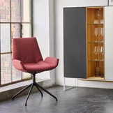 modern upholstered chair with swivel base and highboard modern upholstered chair lui plus with swivel base in matt black and the cubus pure highboard