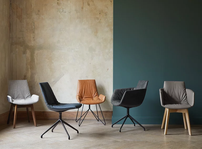 chairs in leather and fabric with metal or wooden frame lui dining chairs with and without armrests in leather and fabric with black matt metal frame and wooden frame in walnut and oak white oil
