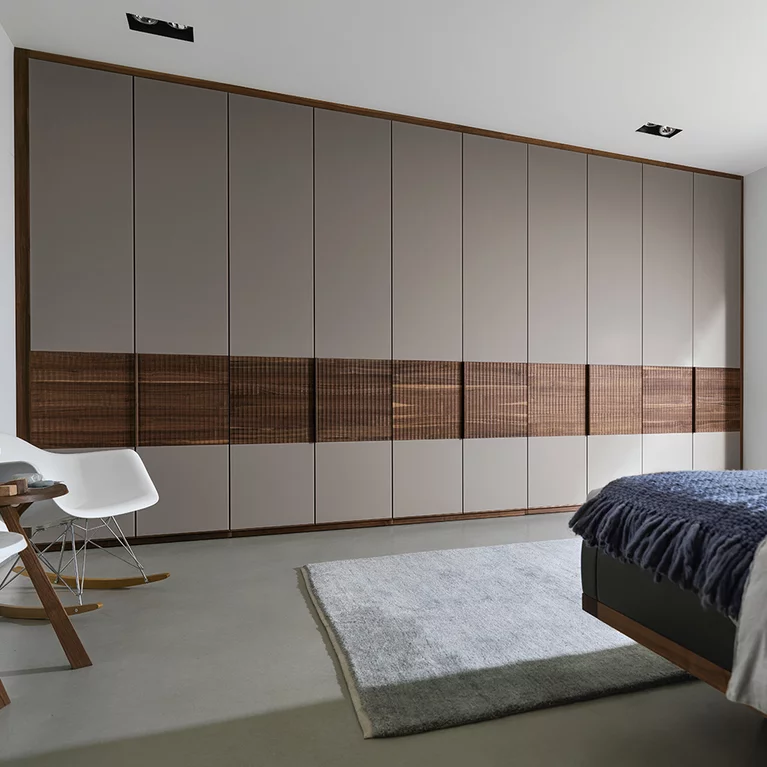 hinge door wardrobe in walnut with wooden band relief and coloured glass fronts valore hinged door wardrobe in walnut with elegant wooden band in relief and coloured glass fronts